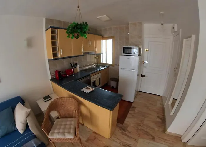 Poseidon Frente A La Playa * 丰希罗拉